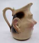 Faïencerie de Sarreguemines - Pichet anthropomorphe - Homme souriant (n°3181 3) vers 1890 et 1920. Faïencerie de Sarreguemines