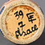 Léon ELCHINGER - Vase Vase à décor de points bleus sur fond jaune et col brun vers 1920 / 1934 (marque). Léon Elchinger