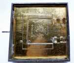 Philip VIELMETTER Clown dessinateur tôle lithographiée - vers 1895 (dessous). Philip Vielmetter