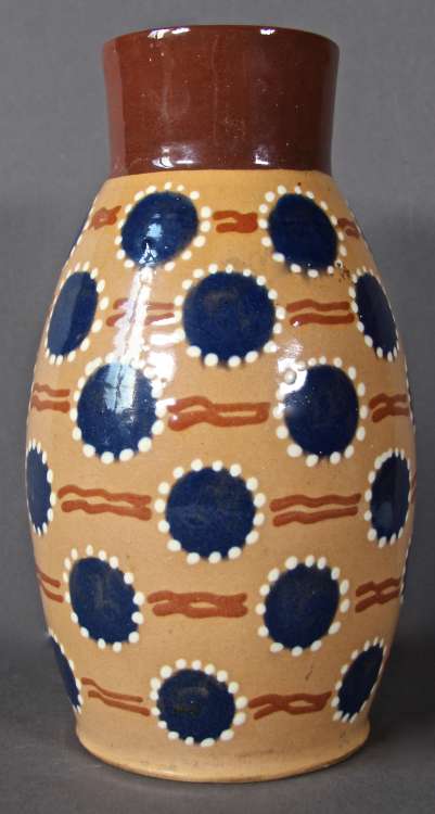 Léon Elchinger - Vase à décor de points bleus sur fond jaune et col brun